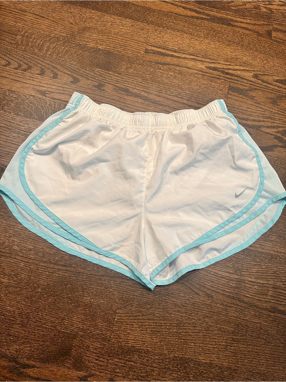 Nike Women’s White Athletic Shorts with Blue Trim